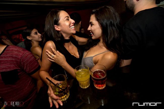 How to Flirt With a Girl at a Bar, According to Girls